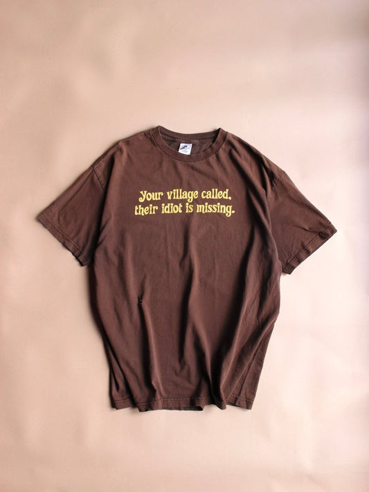 1990s “Your village called, their idiot is missing.” Tee